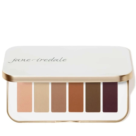 Paleta sześciu cieni do powiek Pure Basics od Jane Iredale to uniwersalne zestawienie neutralnych matowych odcieni, w biało złotym eleganckim kompakcie.