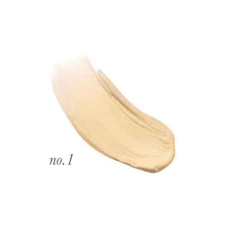 Na zdjęciu przedstawiono odcień korektora Jane Iredale Active Light oznaczony jako No. 1. Odcień został pokazany w formie rozsmarowanej próbki, co pomaga ocenić kolor i konsystencję produktu. No. 1 to bardzo jasny beż, dla jasnej karnacji.