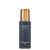 Na zdjęciu znajduje się produkt marki INIKA Organic o nazwie Radiant Glow Veil. elegancka butelka z matowego, ciemnego szkła z metaliczną, złotą nakrętką.