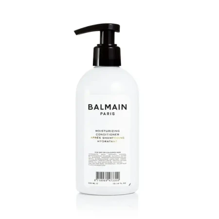 Biała butelka z czarną pompką zawierająca odżywkę nawilżającą Balmain Paris Moisturizing Conditioner. Minimalistyczny design z czarnym napisem, produkt o pojemności 300 ml. Profesjonalna pielęgnacja do suchych lub farbowanych włosów.