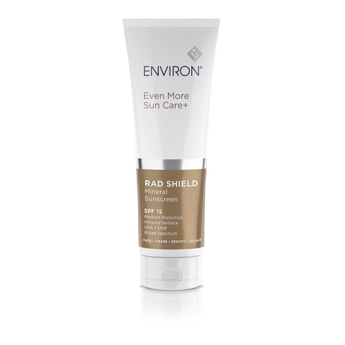 Tubka kremu Environ RAD Shield Mineral Sunscreen w kolorze białym z brązowo białą etykietą i szarym napisem, przeznaczona do ochrony przeciwsłonecznej.