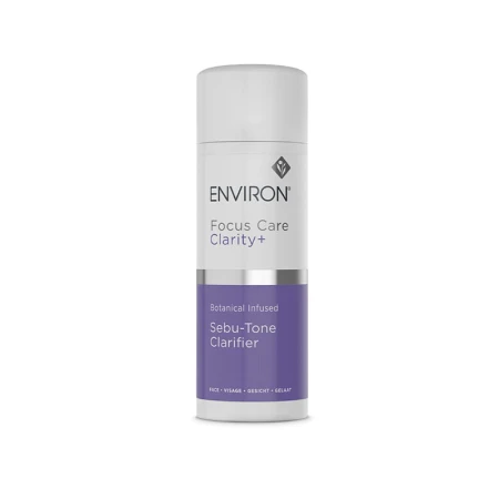 Butelka toniku ENVIRON Sebu-Tone Clarifier w kolorze białym z białą nakrętką i biało-fioletową etykietą.