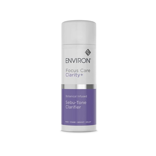 Butelka toniku ENVIRON Sebu-Tone Clarifier w kolorze białym z białą nakrętką i biało-fioletową etykietą.