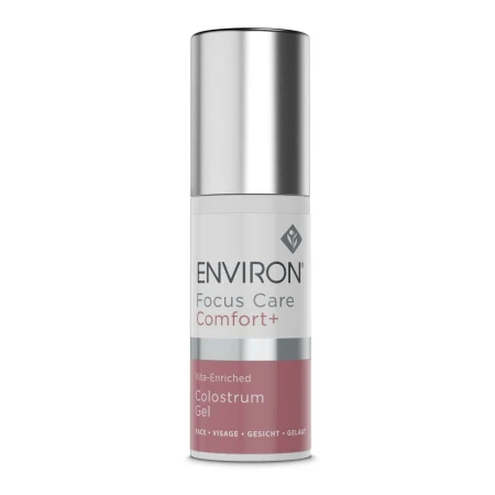 Butelka żelu Environ Focus Care Comfort+ Colostrum Gel z pompką, w kolorze białym z metaliczną, srebrną nakrętką i biało-różową etykietą.