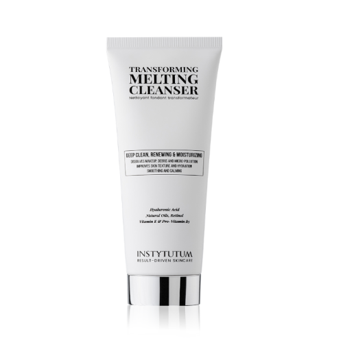 Biała tubka Instytutum Transforming Melting Cleanser z czarnym napisem i srebrnym elementem przy zamknięciu. Produkt oczyszczający, odnawiający i nawilżający, z kwasem hialuronowym, olejem migdałowym i witaminami. Design minimalistyczny.
