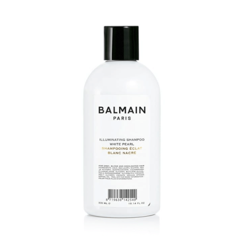 Balmain Paris Illuminating Shampoo White Pearl w białej butelce z czarną nakrętką, pojemność 300 ml.