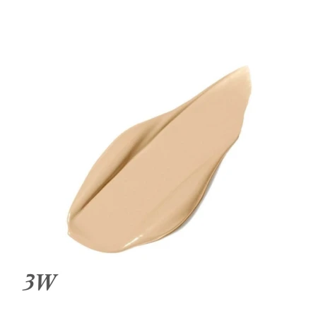 Na zdjęciu jest próbka odcienia korektora Pure Match o numerze 3W. 3W to jasny, ciepły ton. Próbka w postaci rozsmarowanej kropli kremowego korektora pomaga dobrać odpowiedni odcień z podziałem na ciepłe (W) i neutralne (N) tonacje.