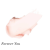 Na zdjęciu widoczny jest odcień Forever You z linii Just Kissed Lip & Cheek Stain marki Jane Iredale.  Kolor produktu ma bardzo delikatny, niemal transparentny odcień z subtelnym różowym tonem.