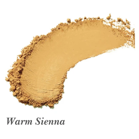 Widoczna jest próbka odcienia pudru amazing base Jane Iredale w odcieniu Warm Sienna: średni beżowy odcień pudru o lekko brzoskwiniowym tonie