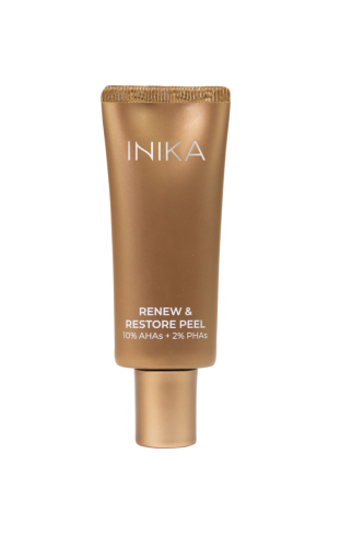 Na zdjęciu znajduje się kosmetyk marki INIKA Organic – Renew & Restore Peel. Produkt zamknięty jest w eleganckiej, złoto-miedzianej tubie z matowym wykończeniem, co podkreśla luksusowy charakter formuły.
