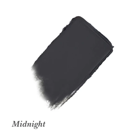 Na zdjęciu widoczna jest próbka kremowego cienia do powiek w odcieniu Midnight od jane iredale. Kolor ten to głęboki granat z chłodnym podtonem, o matowym wykończeniu. Doskonały do wieczorowego makijażu