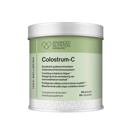 Biała, cylindryczna puszka z zieloną etykietą zawierająca suplement diety Colostrum-C marki Advanced Nutrition Programme. Etykieta informuje o zawartości 60 kapsułek wspierających układ odpornościowy.