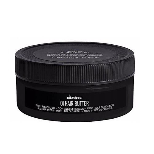 Czarny słoiczek Davines OI Hair Butter o pojemności 75 ml z czarną zakrętką i białym napisem na etykiecie. Produkt zawiera olej roucou i jest przeznaczony do wszystkich typów włosów.
