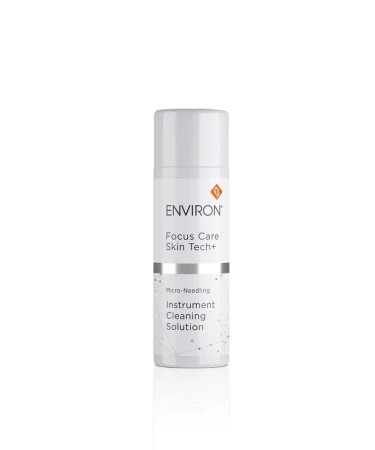 Butelka płynu ENVIRON Instrument Cleaning Solution, w kolorze białym z białą nakrętką i biało-srebrną etykietą.