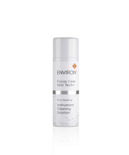 Butelka płynu ENVIRON Instrument Cleaning Solution, w kolorze białym z białą nakrętką i biało-srebrną etykietą.