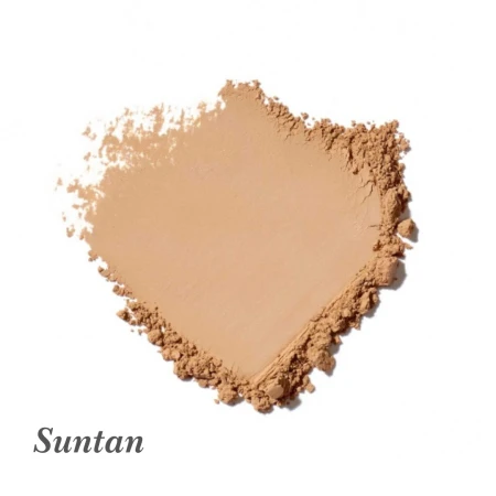 Widoczna jest próbka odcienia pudru amazing base Jane Iredale w odcieniu Suntan: Średni odcień z neutralnym podtonem