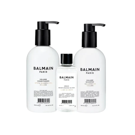 Zestaw BALMAIN Paris VolumegSet – komplet nadających objętości i nawilżających kosmetyków do włosów w eleganckim opakowaniu. Butelki o minimalistycznym, biało-czarnym designie z logo BALMAIN.