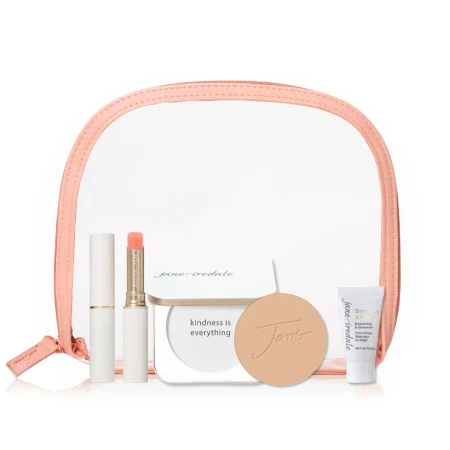 Na zdjęciu zestaw Jane Iredale Forever You który zawiera: puder w wybranym kolorze i białą puderniczkę, pomadkę Firever You, mini bazę Smooth oraz różową kosmetyczkę.