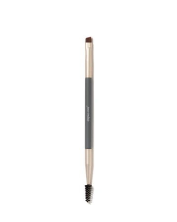 Na zdjęciu dwustronny pędzel do brwi  i oczu marki jane iredale. Z jednej strony ma precyzyjny, ścięty pędzelek do cieni, produktów do brwi. Z drugiej strony jest szczoteczka typu spiralka.