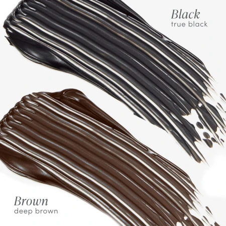 Na zdjęciu widać dwa kolory tuszu do rzęs rozprowadzone na białym tle w formie pociągnięć: Black (true black) — intensywna, głęboka czerń. Brown (deep brown) — ciemny, głęboki brąz.