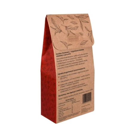 Pudełko herbaty SAROOBOS Rooibos Strawberry Tea. Opakowanie w kolorach białym i różowym z ilustracją gałązki rooibosa z czerwonymi kwiatami. Zawiera 20 torebek. Herbata bezkofeinowa, bogata w antyoksydanty, w 100% naturalna.