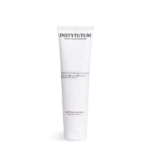 Minimalistyczne ujęcie INSTYTUTUM Adaptogel Cleanser w białej, smukłej tubie. Elegancki, kliniczny design podkreśla profesjonalny charakter produktu.