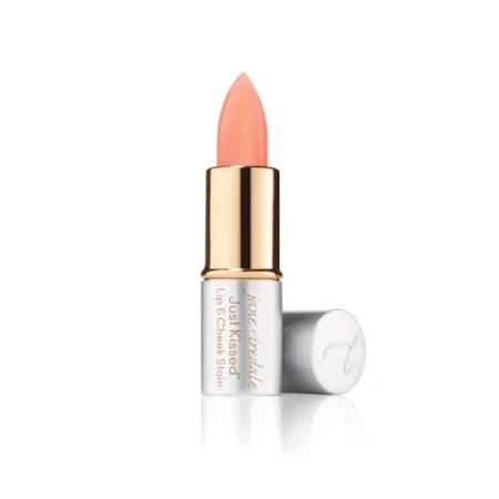 Na-zdjeciu-widoczna-jest-pomadka-Just-Kissed-Lip--Cheek-Stain-marki-Jane-Iredale.-Produkt-ma-eleganckie-opakowanie-w-odcieniach-srebra-i-zlota,-z-odkryta-szminka-w-brzoskwiniowym-kolorze.--Jest-to-wielofunkcy.jpg