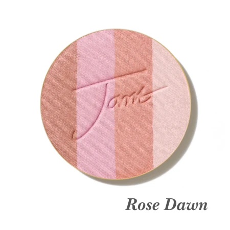 Okrągły, prasowany wielofunkcyjny bronzer do twarzy marki Jane Iredale w odcieniu Rose Dawn z wytłoczonym logo Jane Iredale. Bronzer sklada sie z czterech odcieni.