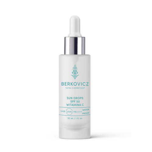 Minimalistyczne ujęcie produktu Berkovicz Tatra Cosmetics – Sun Drops SPF 50 Witamina C na jasnym tle. Białe, eleganckie opakowanie z pipetą i metalicznym wykończeniem