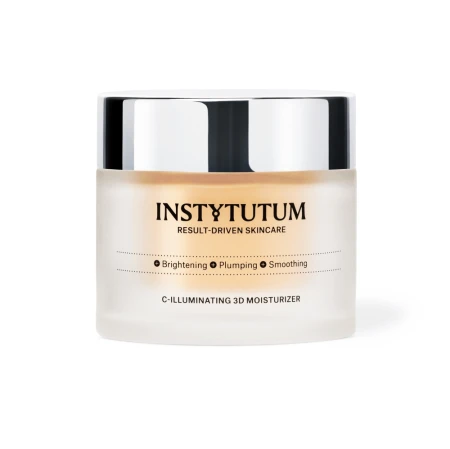 Na zdjęciu widać słoiczek kremu INSTYTUTUM C-Illuminating 3D Moisturizer z matowym, jasnym opakowaniem i srebrną zakrętką na neutralnym tle.