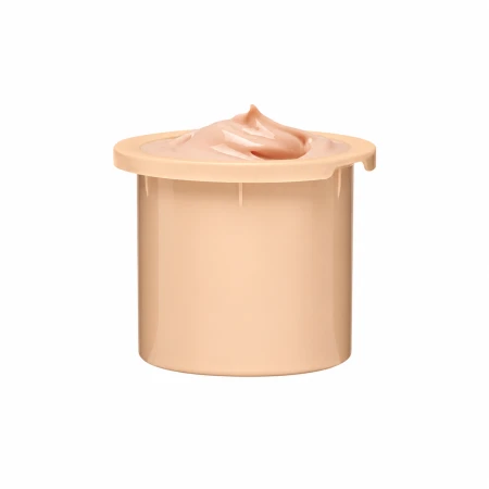 Grafika przedstawia wymienny wkład do kremu INSTYTUTUM C-Illuminating 3D Moisturizer. Brzoskwiniowy pojemnik wypełniony jest kremową formułą o gładkiej, lekko połyskującej konsystencji.