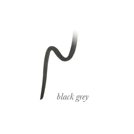 Grafika przedstawia próbkę koloru kredki do oczu jane iredale eye pencil w odcieniu Black Grey – grafitowy (czarno-szary). Miękki odcień czerni z nutą szarości – idealny do dziennego makijażu.